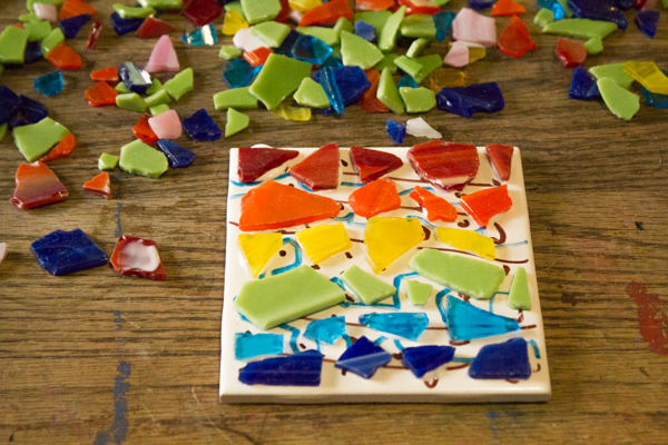 glass bits glued to the upcycled tile base