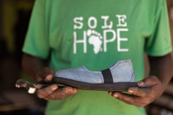 I know that we love to turn our old jeans into quilts and skirts and potholders and tote bags, but the organization Sole Hope has an even better use for them: They save kids' lives.