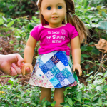Doll clothes are great for busting those teeny-tiny fabric pieces in your stash, and this postage stamp doll skirt is an especially good stash-buster.