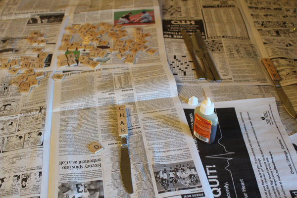 scrabble letters on newspaper