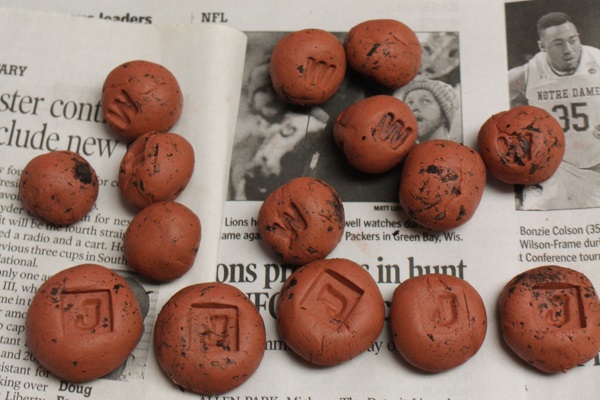 stamped clay seed bombs