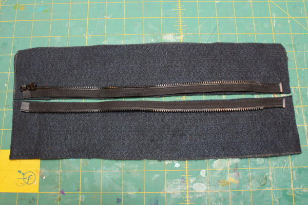 two pieces of material with zipper
