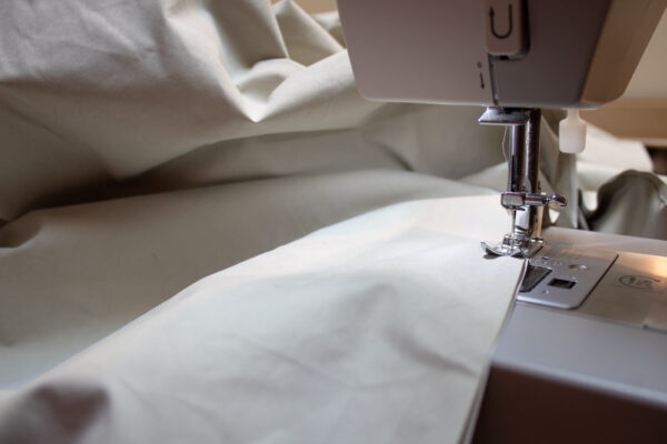 Sew the curtain fabric and lining fabric together.