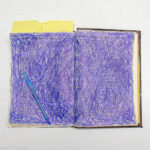 Ink Scribbles in an Altered Book