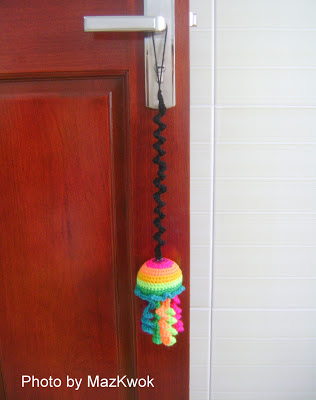 crocheted doorknob hanger via A Crafter XD